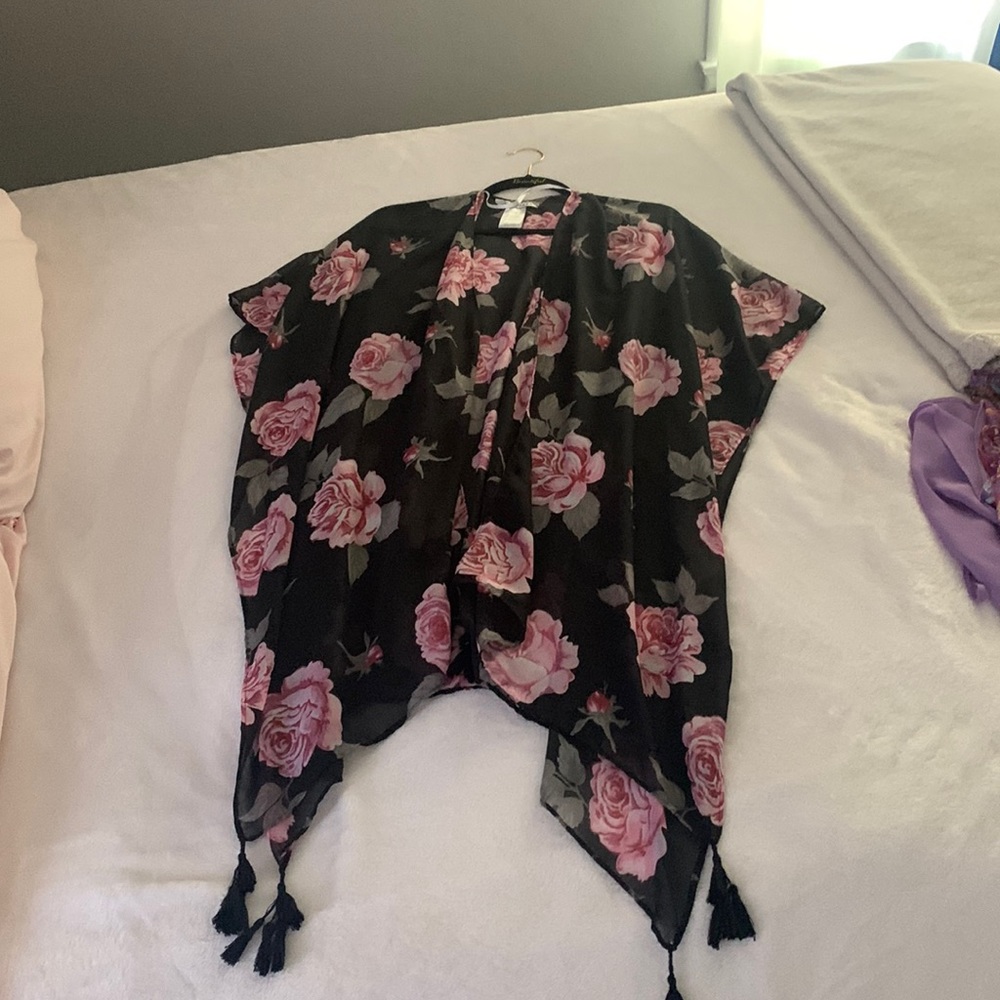 Black with blush pink roses. Worn once cardigan and is one size fits all